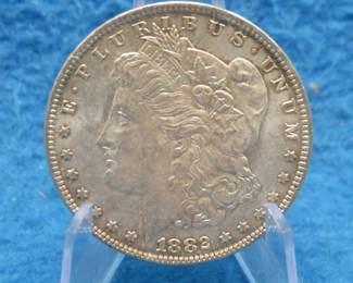 Lot 65. 1882 O Morgan silver dollar