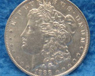 Lot 232. 1885 O Morgan silver dollar