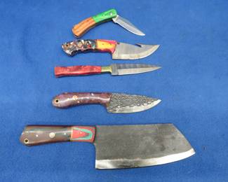 Lot 287. Five new knives with leather sheaths and no markings