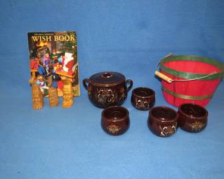 Lot 169. Carved wooden figurines, 1992 Sears Wish book, and a 6-piece serving set from Japan