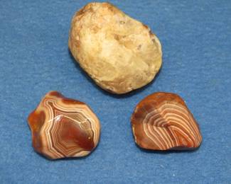 Lot 227. Lake Superior Agate ID set including: Highly polished agate. Semi-polished agate. Uncut unpolished agate.