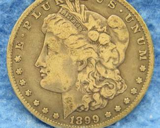 Lot 130. 1899 O Morgan Silver Dollar