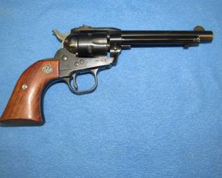 Lot 11. 1957 Ruger single-action flat top Single-Six .22 caliber revolver. S/N 465473. Very good condition.