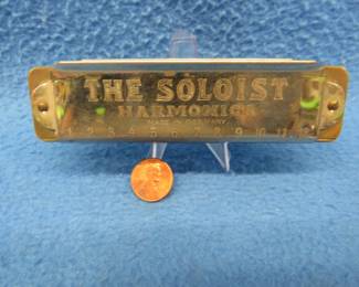 Lot 266. Eagle Brand Soloist 12-hole diatonic harmonica in the key of C. Sounds great.
