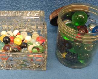 Lot 75. Marbles in two containers