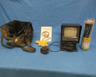 Lot 392. AquaCam underwater camera. Appears complete. Includes camera cable holder. Untested.