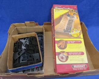 Lot 384. Milescraft Sign Crafter router sign maker with two sizes of letters