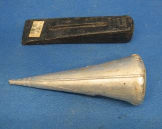 Lot 410. Two wood splitting wedges