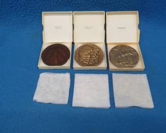Lot 29. Three "Society of Medalists" bronze medallions. Series #25, #83, and #103. Includes 3 holders.