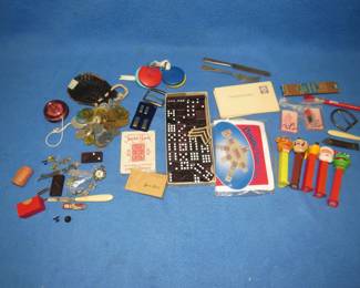 Lot 200. Misc. collectibles including Pez dispensers, tokens, military items, clown-themed knife and fork, and more