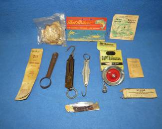 Lot 271. Horrocks and Ibbotson Truth Teller spring scale, brass spring Handy Scale, non-latching folding knife, Hy-Line dressing, fishing line, and more.