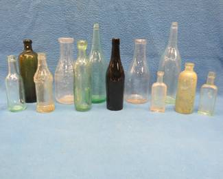 Lot 168. Old bottle collection including embossed bottles