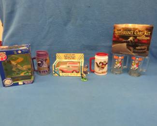 Lot 348. Sports collectibles, die-cast car, and a car care kit