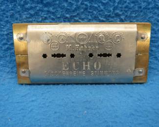 Lot 142. M. Hohner Echo Glockenreine Stimmung double-sided harmonica. Sounds great. Minimum bid $25.