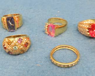 Lot 73. Eight costume jewelry rings.