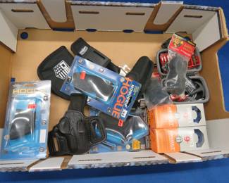 Lot 93. Gun cleaning items, Hogue grip attachments, and more