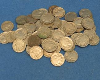 Lot 58. 67 Buffalo nickels. Nearly all have readable dates.
