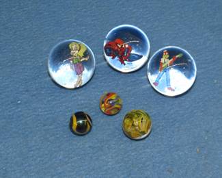 Lot 95. Six collectible sulphide marbles including three shooters with figures