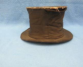 Lot 99. Very old collapsible opera hat in fair condition
