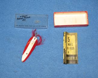 Lot 198. Eppinger 3 1/2" weedless Dardevle in the box with papers