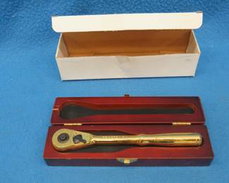 Lot 366. Craftsman 2012 75th anniversary commemorative ratchet in a wooden case. Case is cracked.