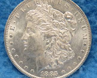 Lot 231. 1885 O Morgan silver dollar