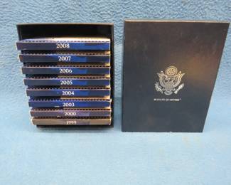 Lot 125. Eight US Mint State Quarter proof sets in a display box