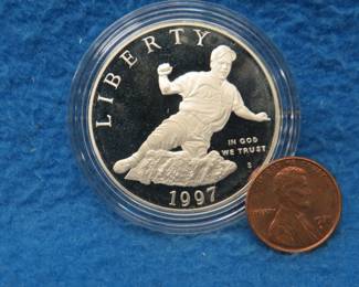 Lot 77. 1997 Jackie Robinson commemorative $1.00 silver dollar. Weight 26.7 grams. 90% silver