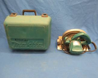 Lot 395. Makita 7 1/4" circular saw with case. Model 5007NB.