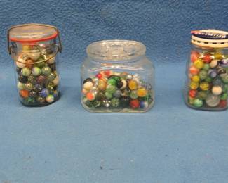 Lot 358. Three jars of marbles