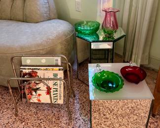 The magazine rack, and two mirrored tables were sold.
