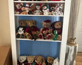 White Bookcase with Blue Beadboard Back & White Shutter Side Panels, filled with HERRODs Teddy Bears