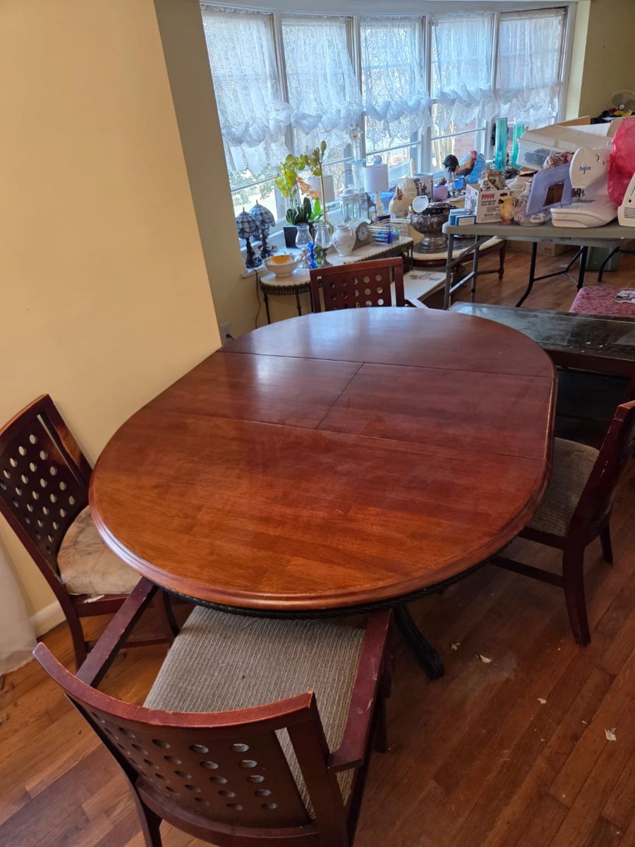 #1	Wood Round Dining Pedestal Table w/2 leaves stored inside 4  chairs (2 captains Chairs/ 1 needs to be recovered ) - 48-66x48x38	 $175.00 

