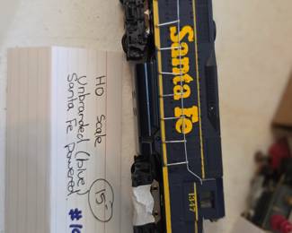 #109	HO scale Santa Fe engine unbranded Blue 	 $15.00 
