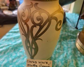 #45	Clarus ware matte cream w/gold scroll work design vase	 $75.00 
