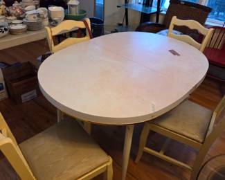 #38	Formica top w/metal Legs Oval Table w/4 chairs (as is condition) - 49x35x29	 $40.00 
