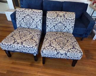 #14	Pair of Blue & White Covered Parsons Chairs w/Black Legs (as is cat scratches on side) 	 $40.00 
