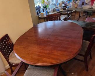 #1 Wood Round Dining Pedestal Table w/2 leaves stored inside 4 chairs (2 captains Chairs/ 1 needs to be recovered ) - 48-66x48x38 $175.00