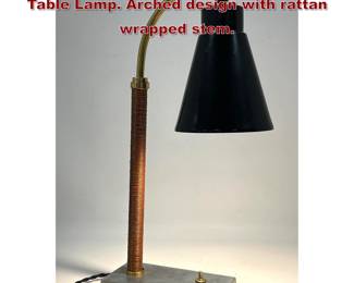 Lot 156 Mutual Sunset Company Adjustable Table Lamp. Arched design with rattan wrapped stem. 