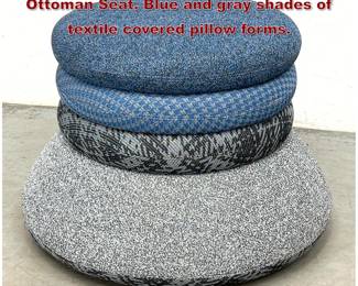 Lot 455 Stacked Pillow style Foot Stool Ottoman Seat. Blue and gray shades of textile covered pillow forms. 