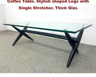 Lot 94 Ebonized Wood X Side Glass Top Coffee Table. Stylish shaped Legs with Single Stretcher. Thick Glas