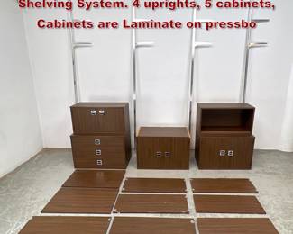 Lot 258 Mid Century Modern Modular Shelving System. 4 uprights, 5 cabinets, Cabinets are Laminate on pressbo