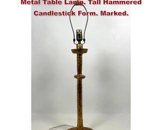 Lot 559 UTTERMOST Heavy Hammered Metal Table Lamp. Tall Hammered Candlestick Form. Marked. 