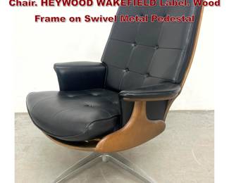 Lot 108 Mid Century Modern Swivel Lounge Chair. HEYWOOD WAKEFIELD Label. Wood Frame on Swivel Metal Pedestal