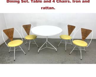 Lot 461 ShaverHoward Mid Century Modern Dining Set. Table and 4 Chairs. Iron and rattan. 
