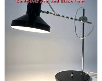 Lot 217 Modernist Desk Task Lamp. Chrome Cantilever Arm and Black Trim. 