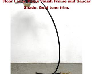 Lot 525 Mid Century Modern Arched Metal Floor Lamp. Black Finish Frame and Saucer Shade. Gold tone trim. 