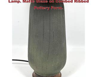 Lot 613 Mid Century Modern Glazed Pottery Lamp. Matte Glaze on Combed Ribbed Pottery Form. 
