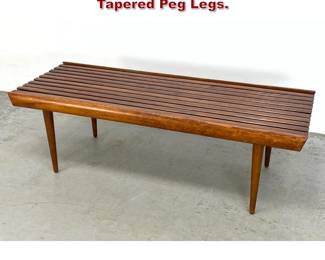Lot 856 MCM Wood Slat Bench. Long Tapered Peg Legs. 