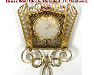 Lot 750 Hollywood Regency Style ImHof Brass Wall Clock. Retailed J E Caldwell. Swiss. 